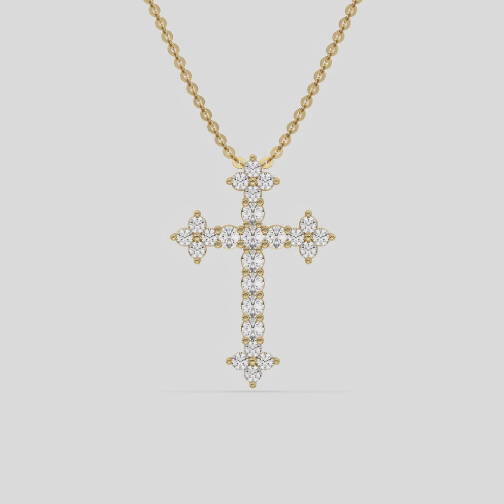 This yellow gold Cross Diamond Necklace made with round brilliant-cut diamonds, securely set in shared prong setting