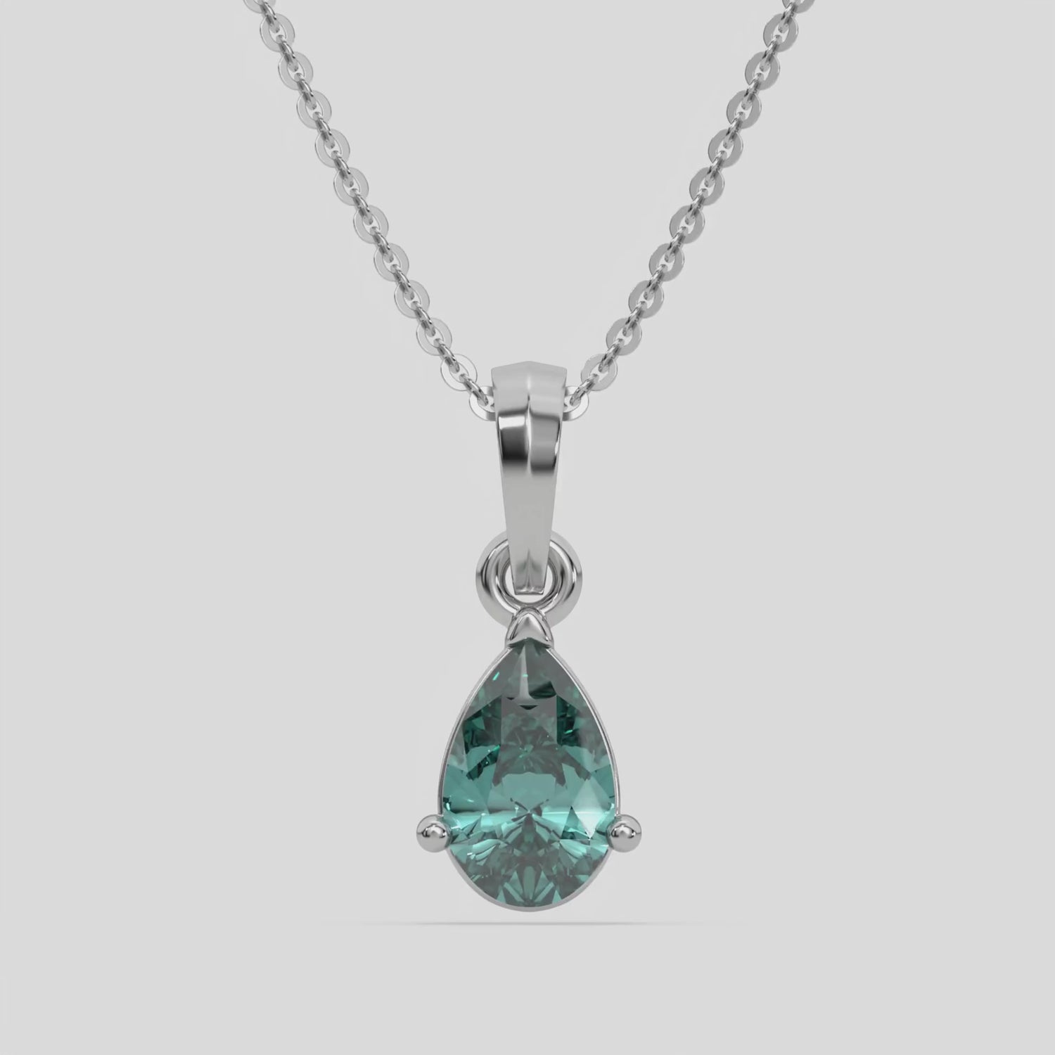 This white gold Fancy Green Pear Solitaire Diamond Necklace made with a fancy Green pear cut diamond in a four prong setting with adjustable chain 