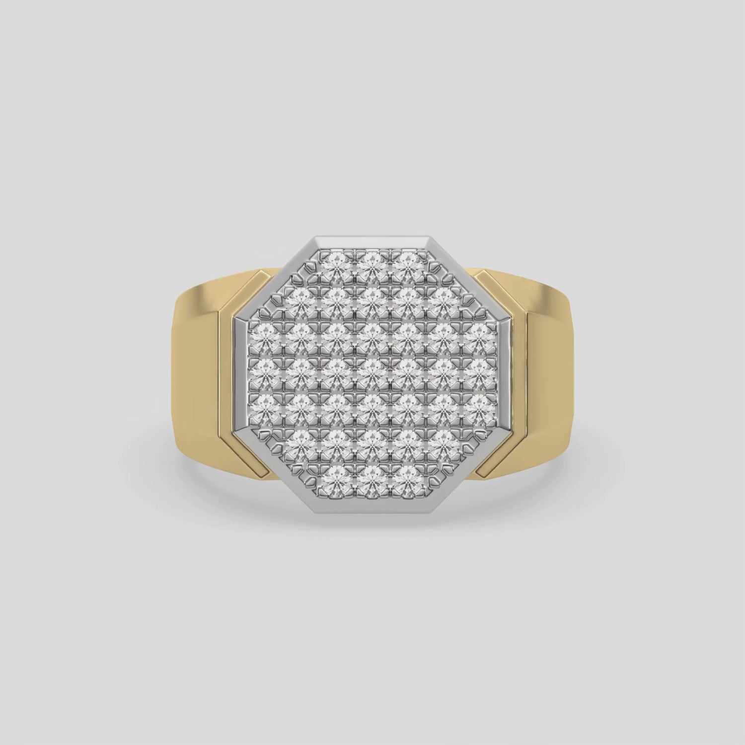 This video features a yellow gold Octagon diamond ring features an octagon disk formed with cluster of round cut diamonds set in a shared pave setting and a glossy band