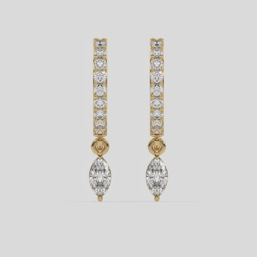 This video features a yellow gold Dangling Marquise Diamond Hoop Earrings handmade with round brilliant-cut diamonds in prong setting and a marquise solitaire hanging at the bottom