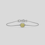 Fancy Yellow Solitaire Round Diamond Bracelet made with fancy yellow round brilliant-cut diamond, securely set in bezel setting