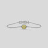 Fancy Yellow Solitaire Round Diamond Bracelet made with fancy yellow round brilliant-cut diamond, securely set in bezel setting