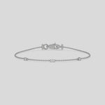 Three Round Diamond Bracelet made with three round brilliant-cut diamond set at distance and securely set in prong setting