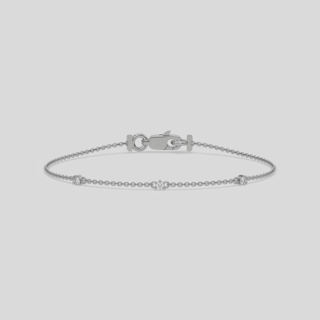 Three Round Diamond Bracelet made with three round brilliant-cut diamond set at distance and securely set in prong setting