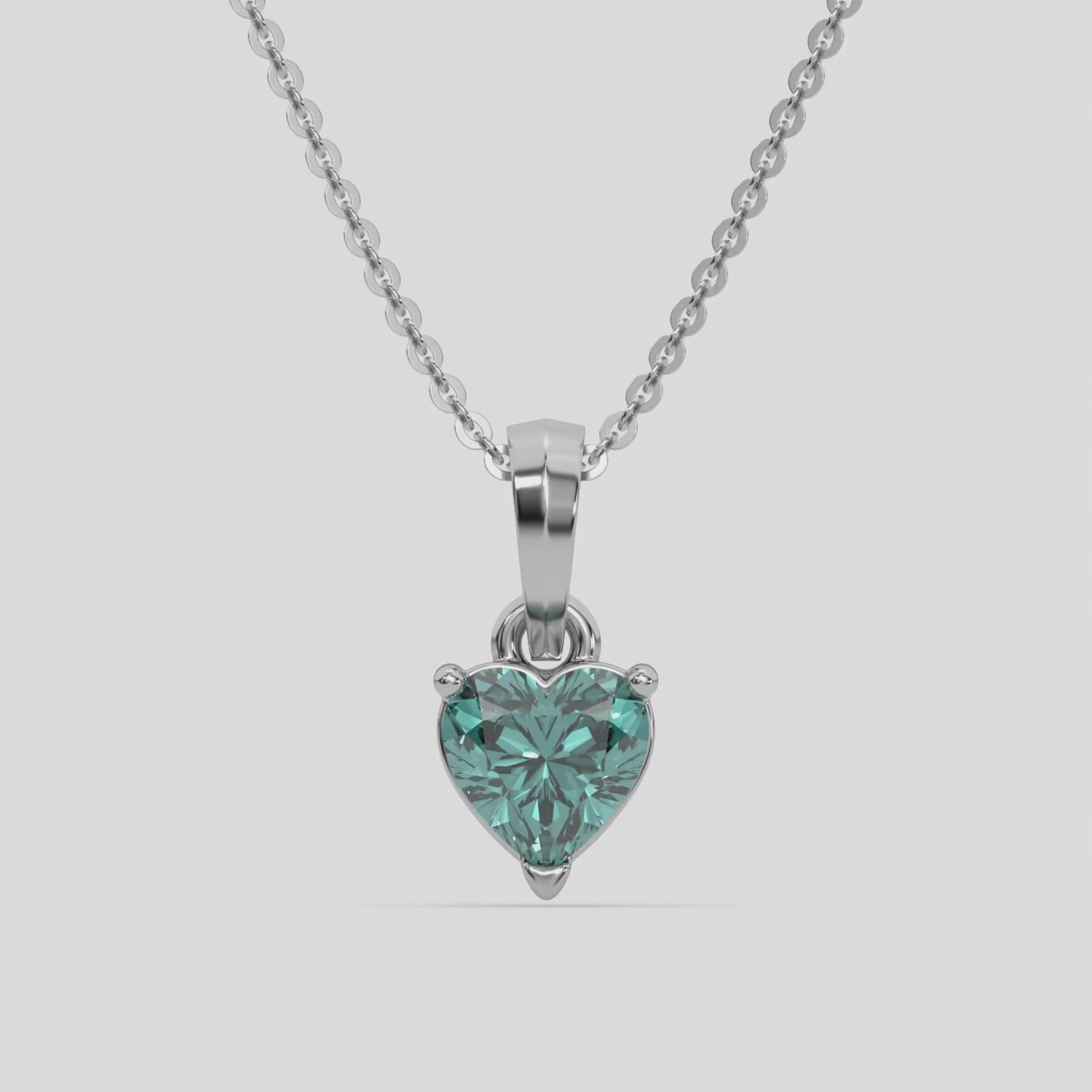  Fancy Green Heart Solitaire Diamond Necklace made with a fancy Green heart cut diamond in a four prong setting with adjustable chain 