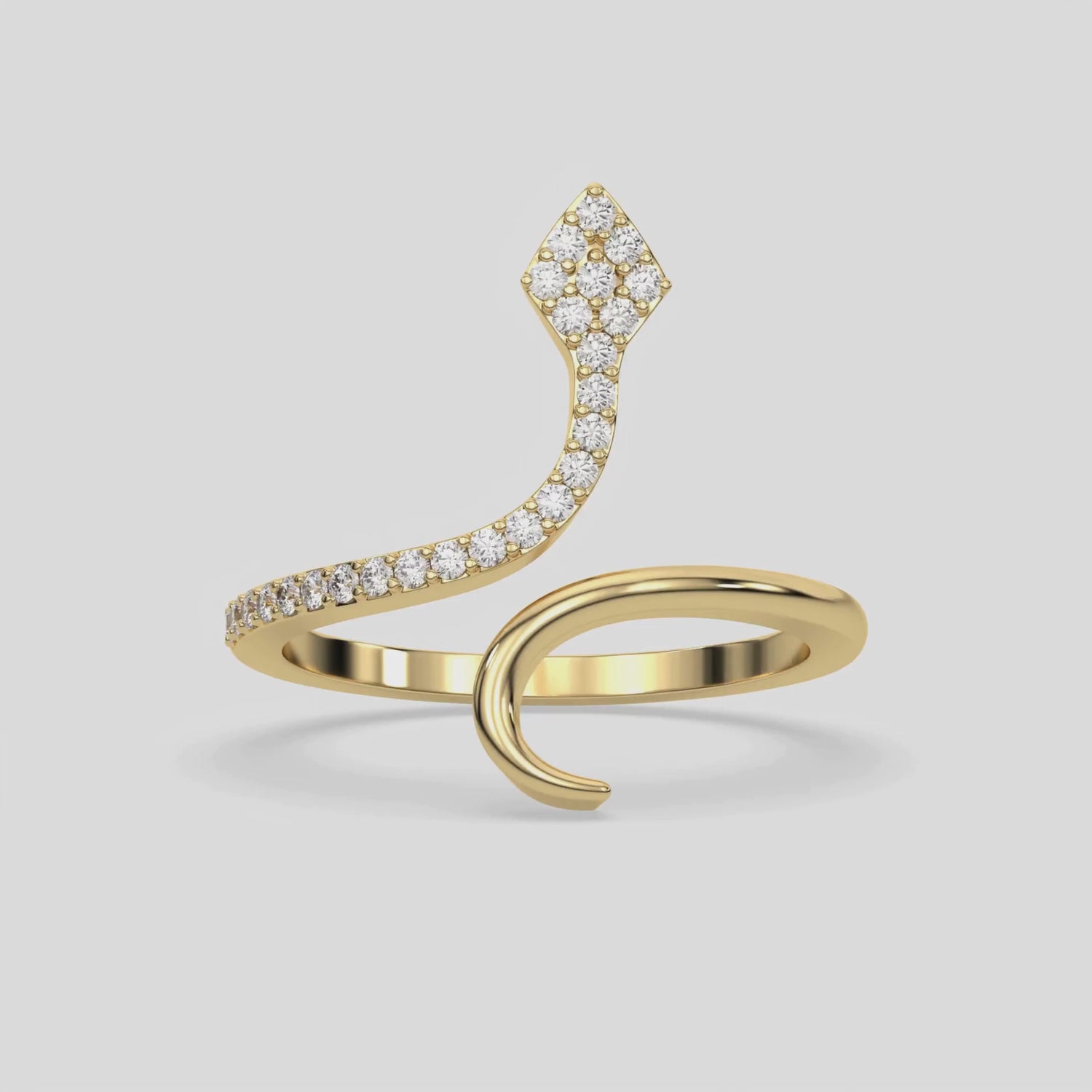 This video features a yellow gold Snake Twist Round Diamond Ring made with brilliant cut round diamonds and set in a beautiful micro pave setting