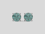 18k white gold Round Diamond Studs made with fancy green round brilliant-cut diamonds set in a four prong setting