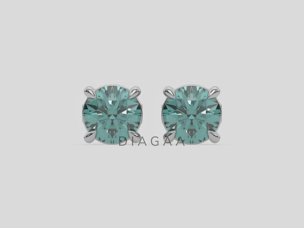 18k white gold Round Diamond Studs made with fancy green round brilliant-cut diamonds set in a four prong setting