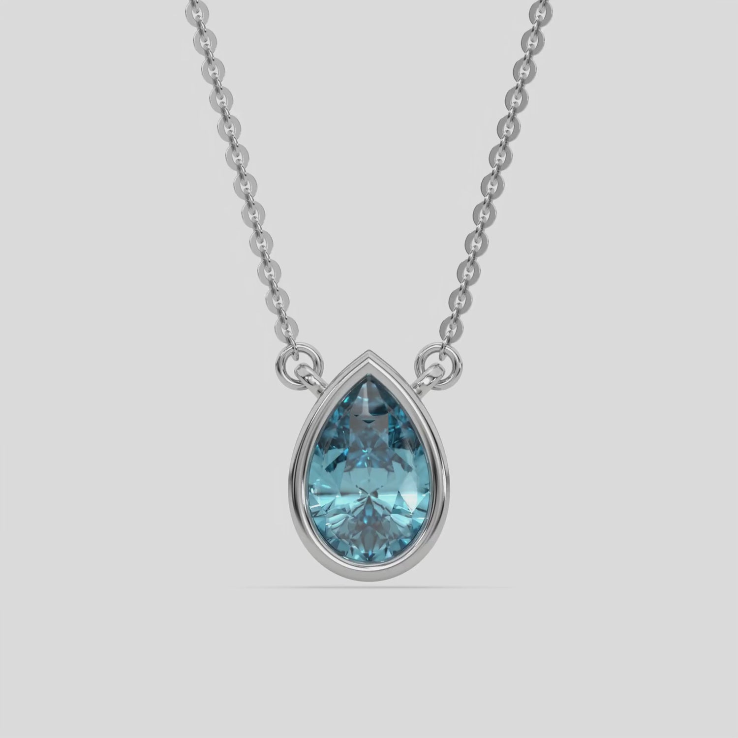  Fancy Blue Pear Solitaire Diamond Necklace made with a fancy Blue pear cut diamond in bezel setting with adjustable chain 