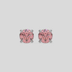 This video features a white gold Classic Round Diamond Studs made with fancy pink round brilliant-cut diamonds set in a four prong setting