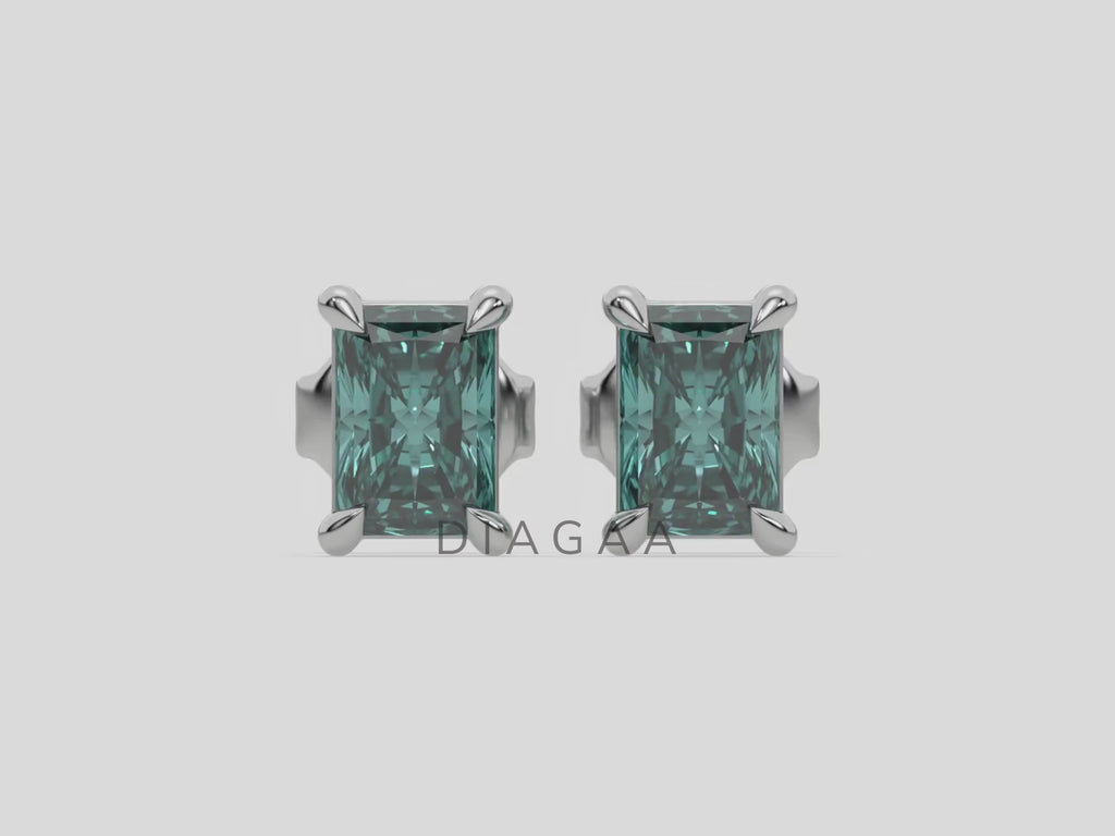 14k white gold Radiant Diamond Earrings made with a fancy green radiant cut diamond set in a four prong setting