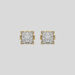 This video features a yellow gold Classic Princess Diamond Earrings made with a princess-cut diamonds set in a four v-prong setting