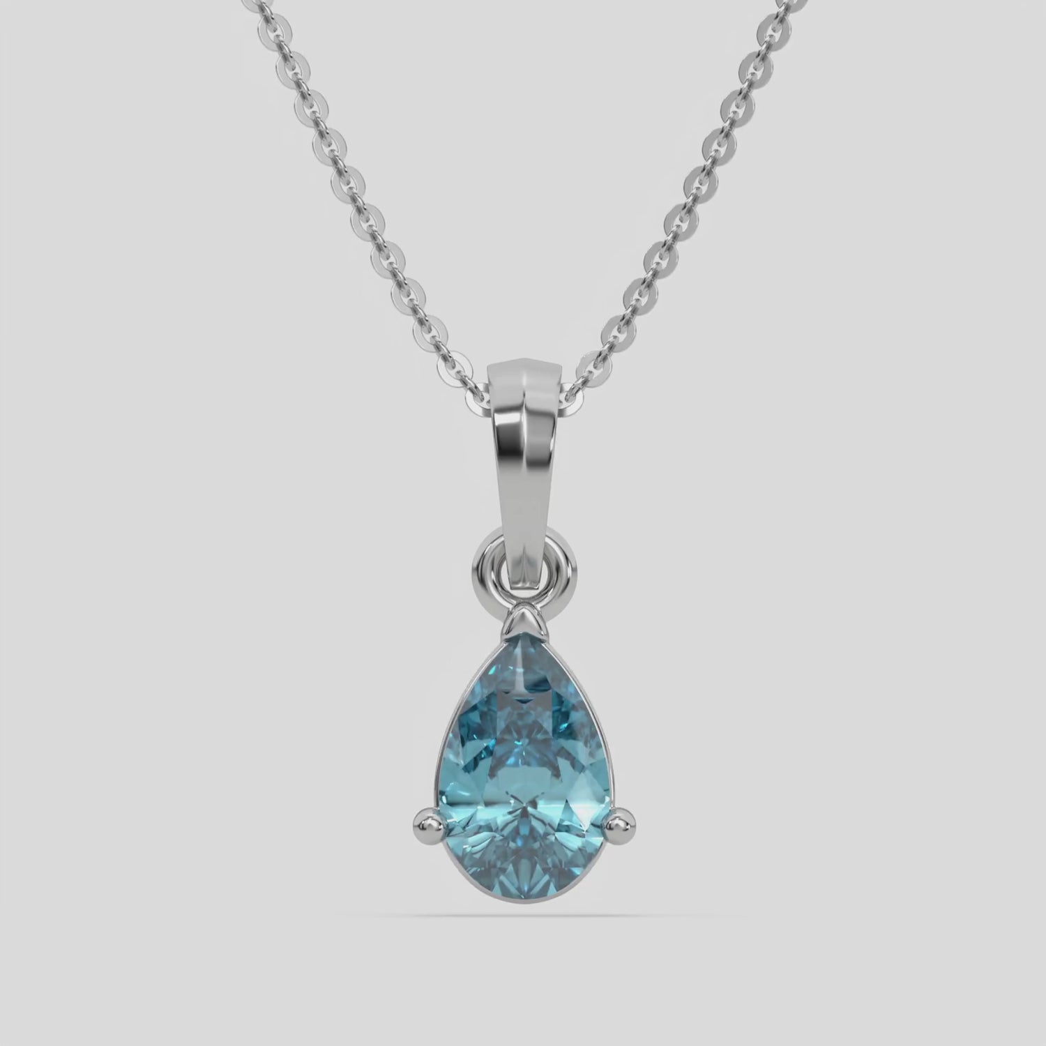 This white gold Fancy Blue Pear Solitaire Diamond Necklace made with a fancy Blue pear cut diamond in a four prong setting with adjustable chain 