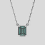  Fancy Green Emerald Solitaire Diamond Necklace made with an fancy Green emerald cut diamond in bezel setting with adjustable chain 