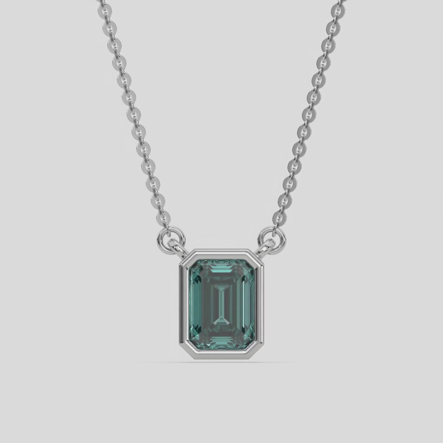  Fancy Green Emerald Solitaire Diamond Necklace made with an fancy Green emerald cut diamond in bezel setting with adjustable chain 