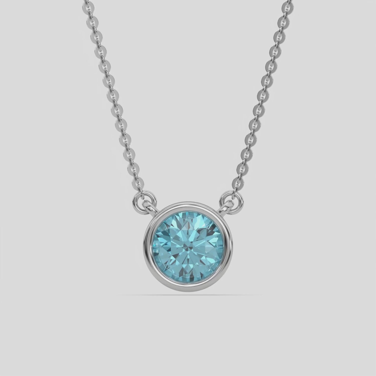  Fancy Blue Round Solitaire Diamond Necklace made with a fancy Blue round brilliant-cut diamond in bezel setting with adjustable chain