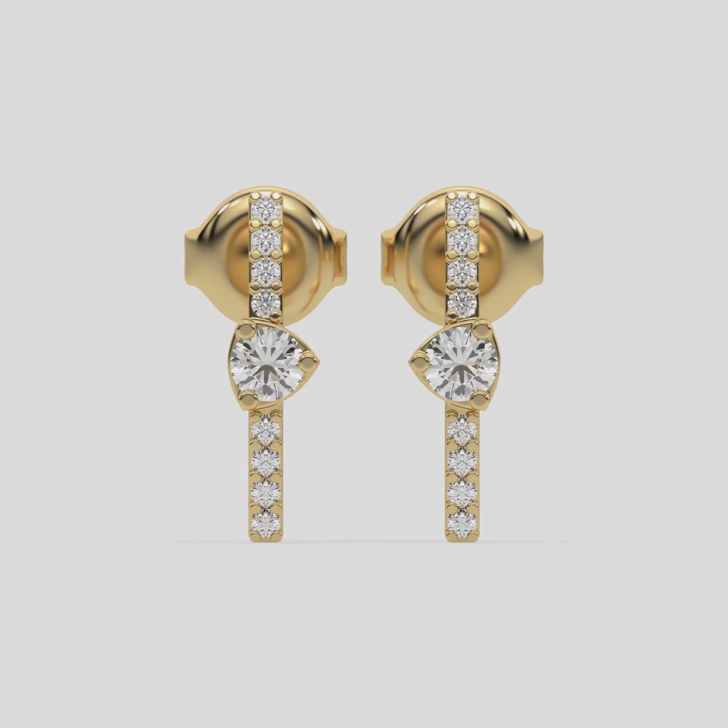 This video features a yellow gold Bar Diamond Earrings made with small round brilliant-cut diamonds in pave setting