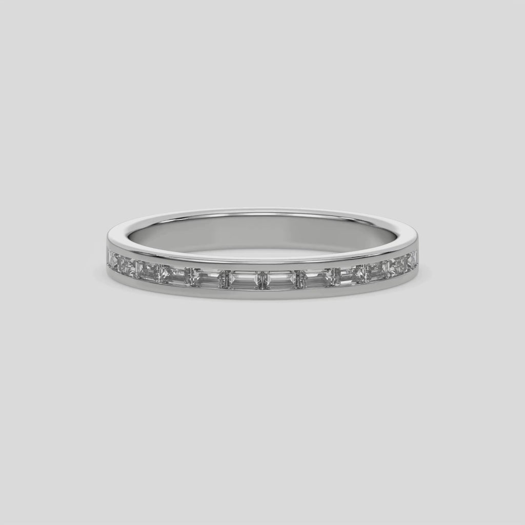 This video features a white gold Half Eternity Channel band is made with 12 baguette diamonds and set in channel setting