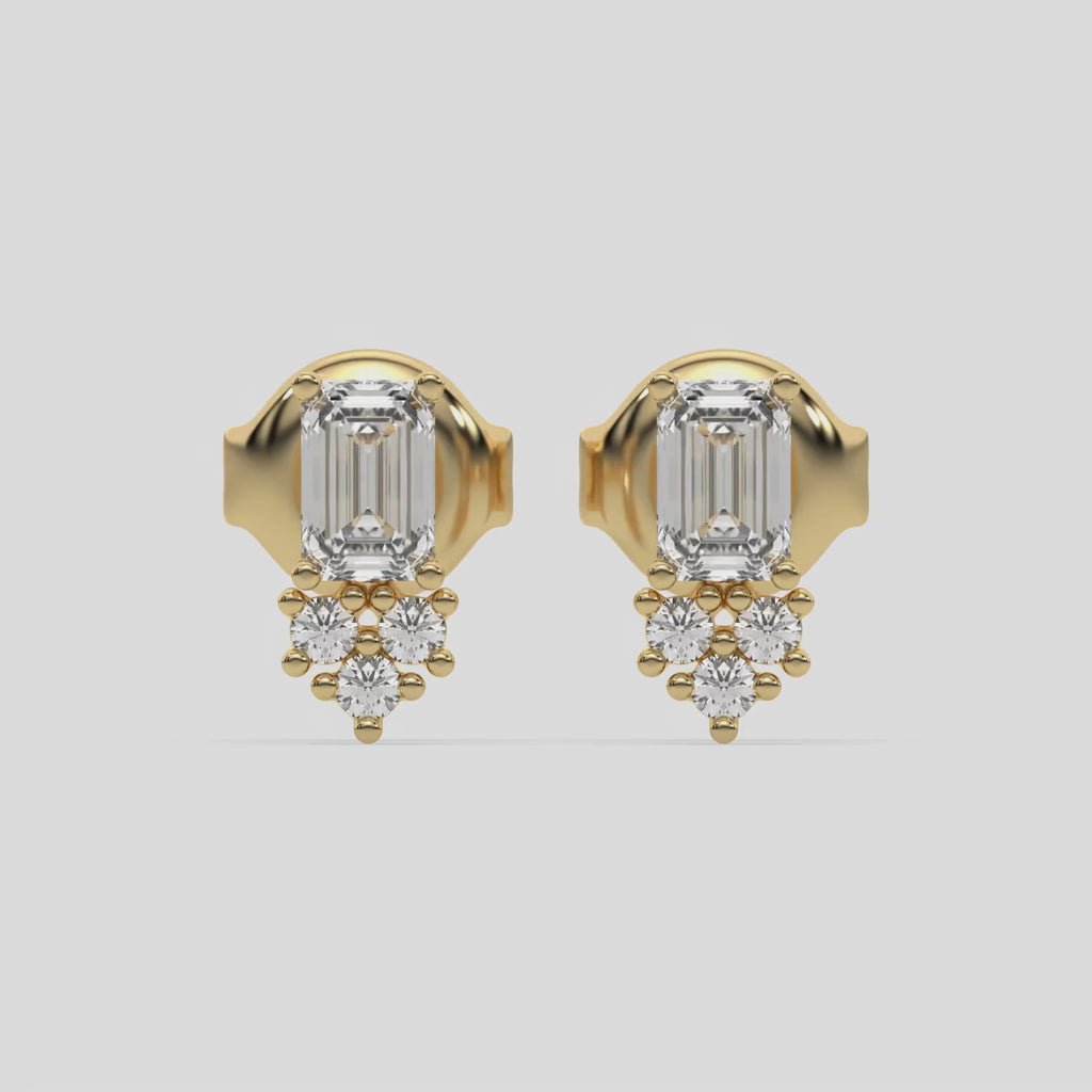 This video features a yellow gold Cluster Diamond Studs made with two different cuts of diamonds, radiant and round. The unique combination of different shapes forms a unique cluster design and all set in a prong setting