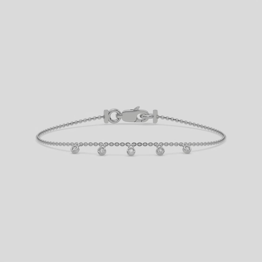 Dangling Round Diamond Bracelet made with five round brilliant-cut diamond securely set in bezel setting