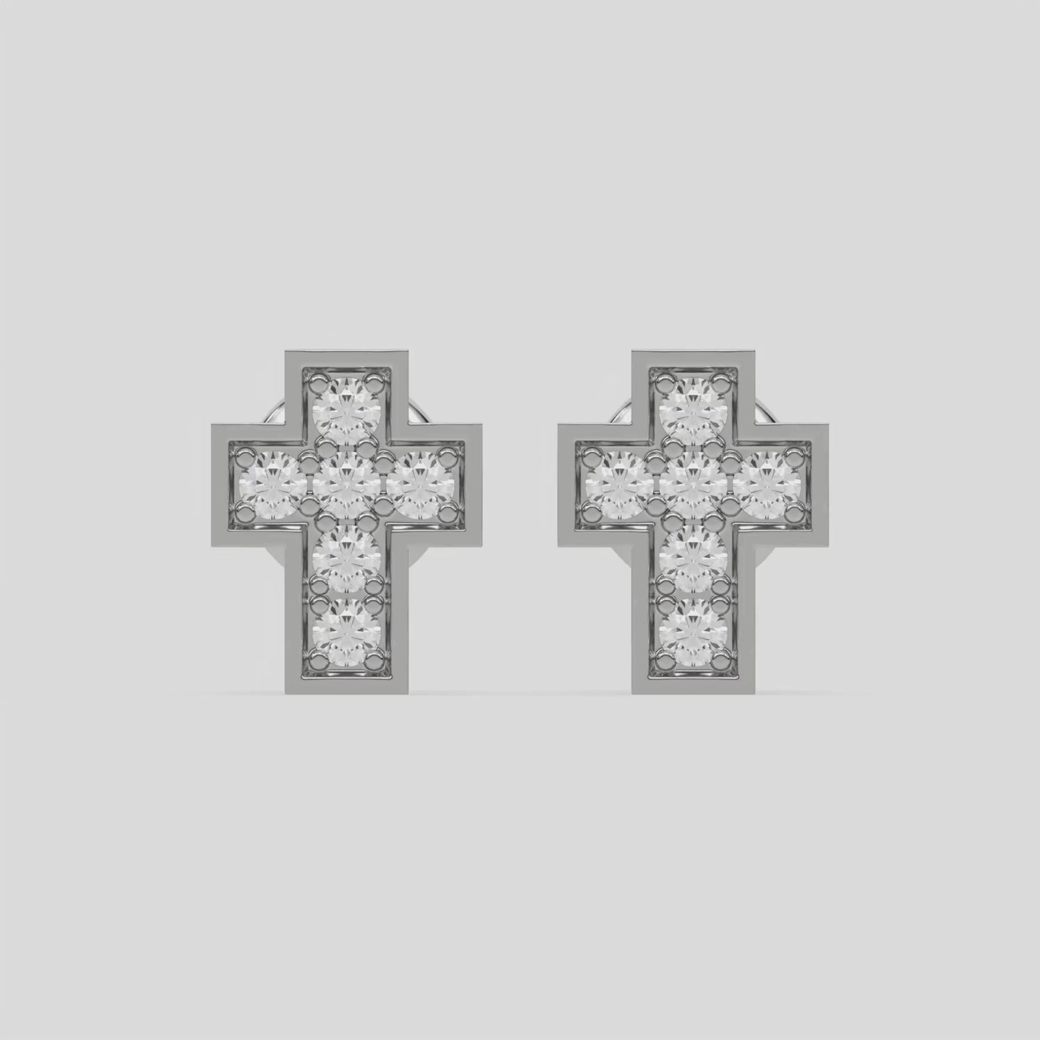 This video features a white gold Mini Cross Diamond Studs made with small round brilliant-cut diamonds and set closely together in micro pave setting