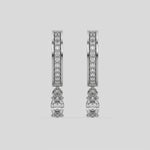 This video features a white gold Dangling Oval Diamond Hoop Earrings handmade with round brilliant-cut diamonds in pave setting and an oval solitaire hanging at the bottom