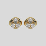 This video features a yellow gold Trio Diamond Earrings made using two round brilliant-cut diamonds and a pear diamond, securely set in prong setting