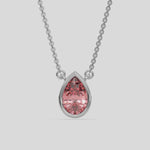 This white gold Fancy Pink Pear Solitaire Diamond Necklace made with a fancy Pink pear cut diamond in bezel setting with adjustable chain 