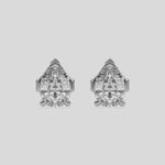 This video features a white gold Classic Pear Diamond Earrings made with a pear-cut diamonds set in a four prong setting