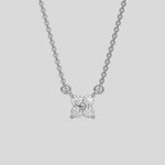  Round Diamond Necklace made with four round brilliant-cut diamonds, securely set in shared prong setting