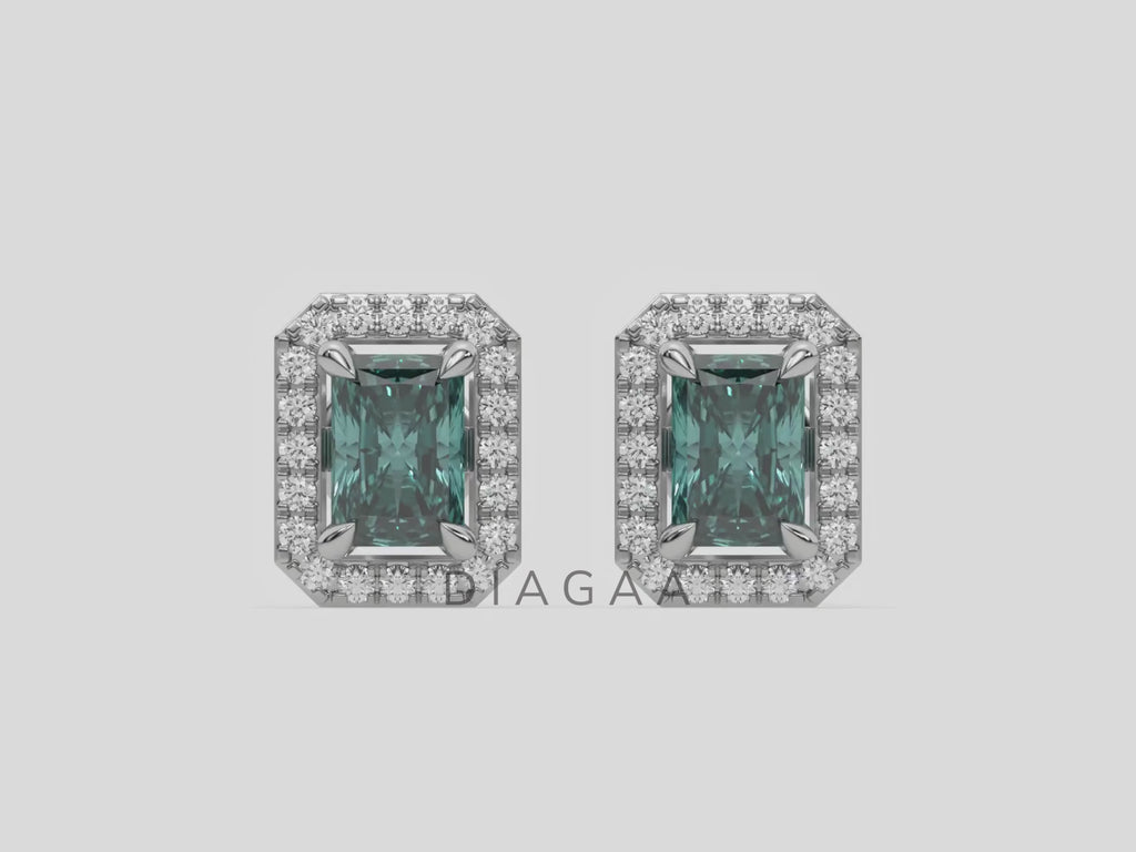 18k white gold Radiant Diamond Halo Earrings made with a fancy green radiant cut solitaire diamonds set in a four prong setting