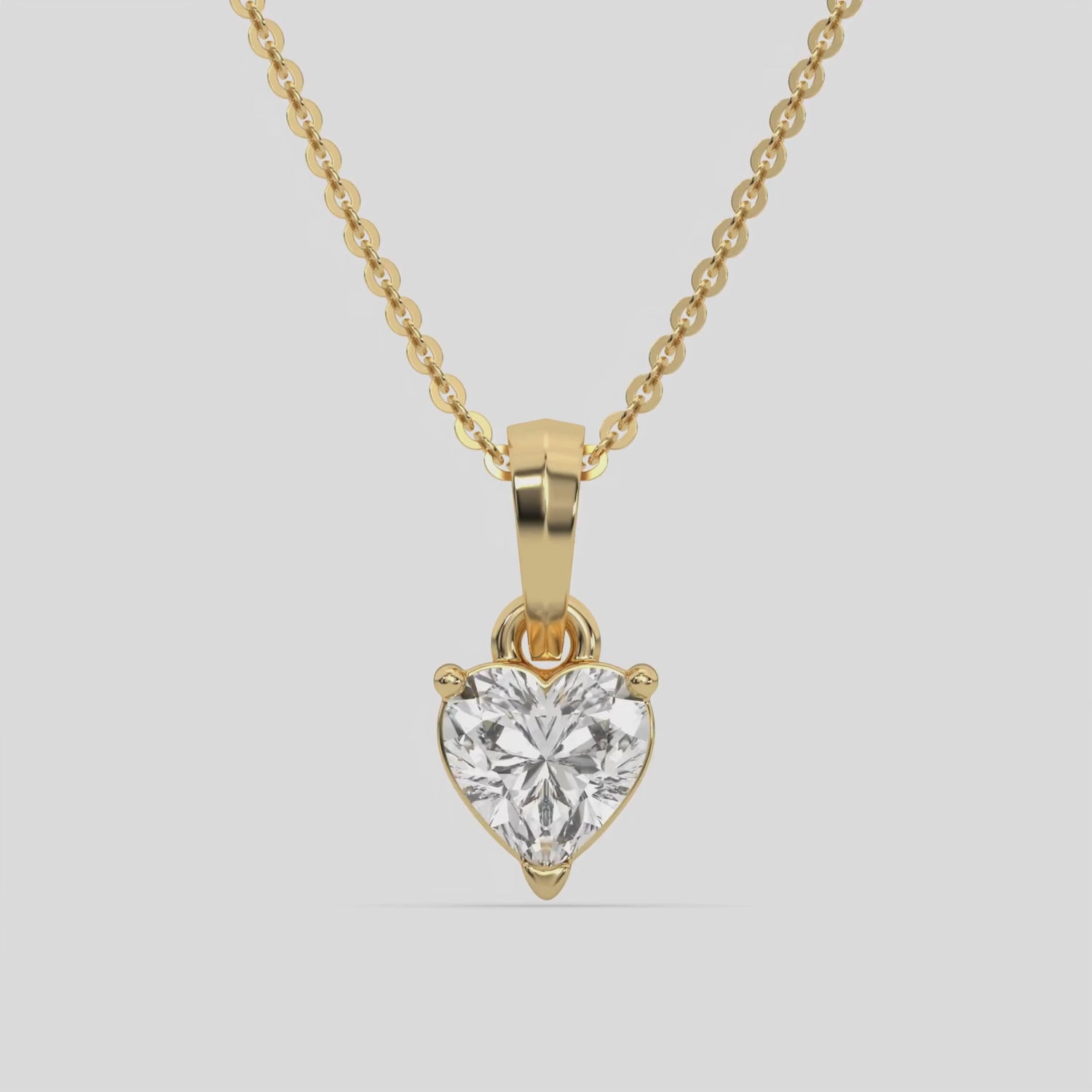  Heart Solitaire Diamond Necklace made with a heart cut diamond in a four prong setting with adjustable chain 