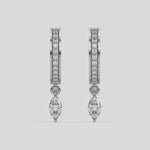 This video features a white gold Dangling Marquise Diamond Hoop Earrings handmade with round brilliant-cut diamonds in pave setting and a marquise solitaire hanging at the bottom