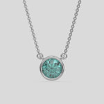  Fancy Green Round Solitaire Diamond Necklace made with a fancy Green round brilliant-cut diamond in bezel setting with adjustable chain 