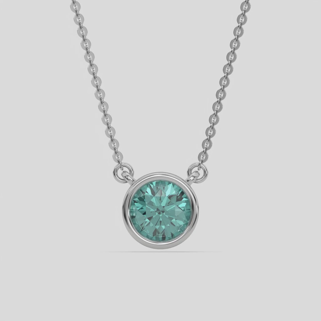  Fancy Green Round Solitaire Diamond Necklace made with a fancy Green round brilliant-cut diamond in bezel setting with adjustable chain 