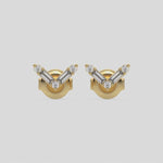 This video features a yellow gold Chevron Diamond Earrings made using baguette and round diamonds creating a v shaped design, securely set in shared prong setting