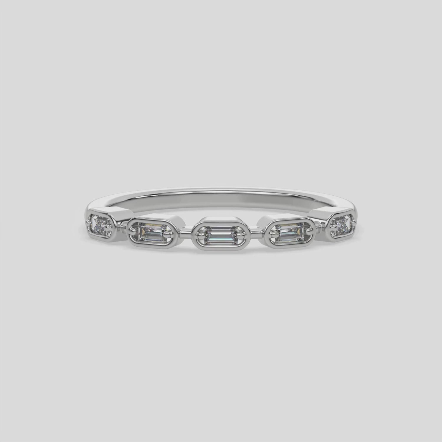 This video features a white gold 5 Baguette Diamond Ring handmade with five baguette diamonds and arranged in a horizontal orientation, while each diamond is set individually in a bezel setting