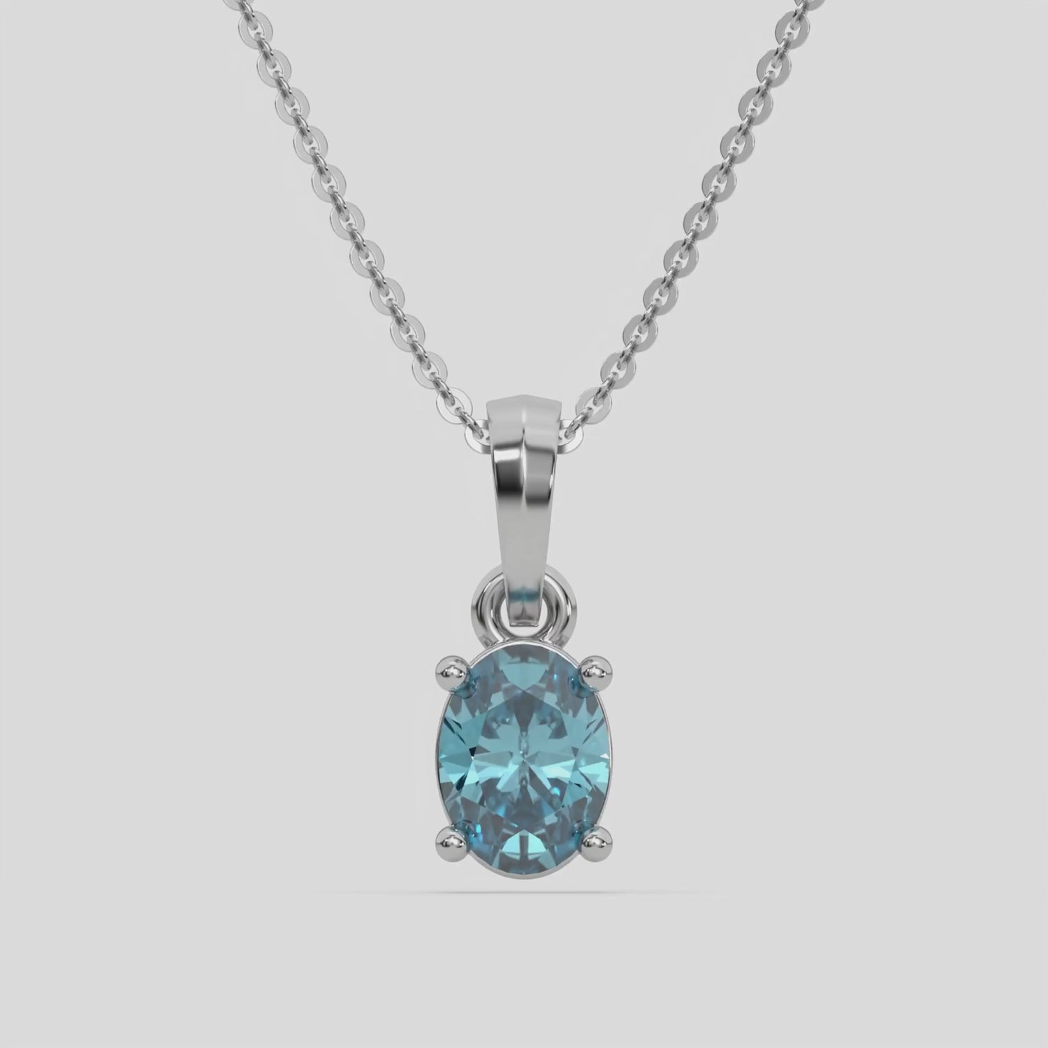 This white gold Fancy Blue Oval Solitaire Diamond Necklace made with an fancy Blue oval cut diamond in a four prong setting with adjustable chain 