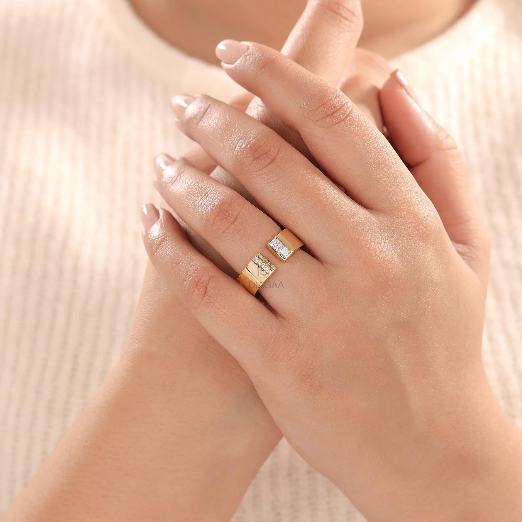Woman wearing a 18K yellow gold princess diamond open cuff wedding band