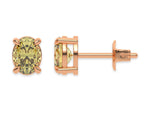 18k rose gold oval diamond stud Earrings made with an fancy yellow oval cut diamond set in a four prong setting