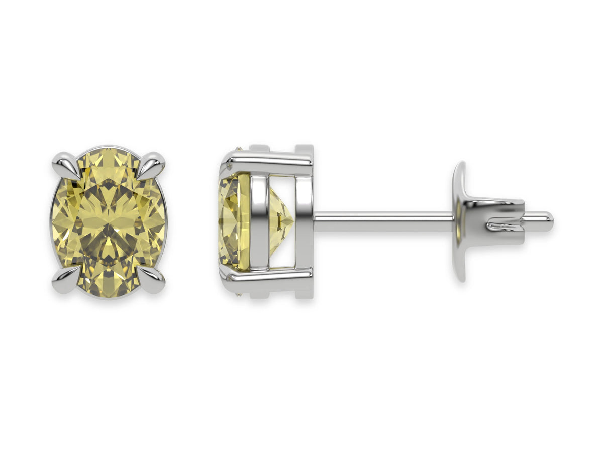 14k white gold oval diamond stud Earrings made with an fancy yellow oval cut diamond set in a four prong setting