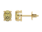18k yellow gold oval diamond stud Earrings made with an fancy yellow oval cut diamond set in a four prong setting