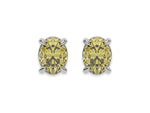 10k white gold oval diamond stud Earrings made with an fancy yellow oval cut diamond set in a four prong setting