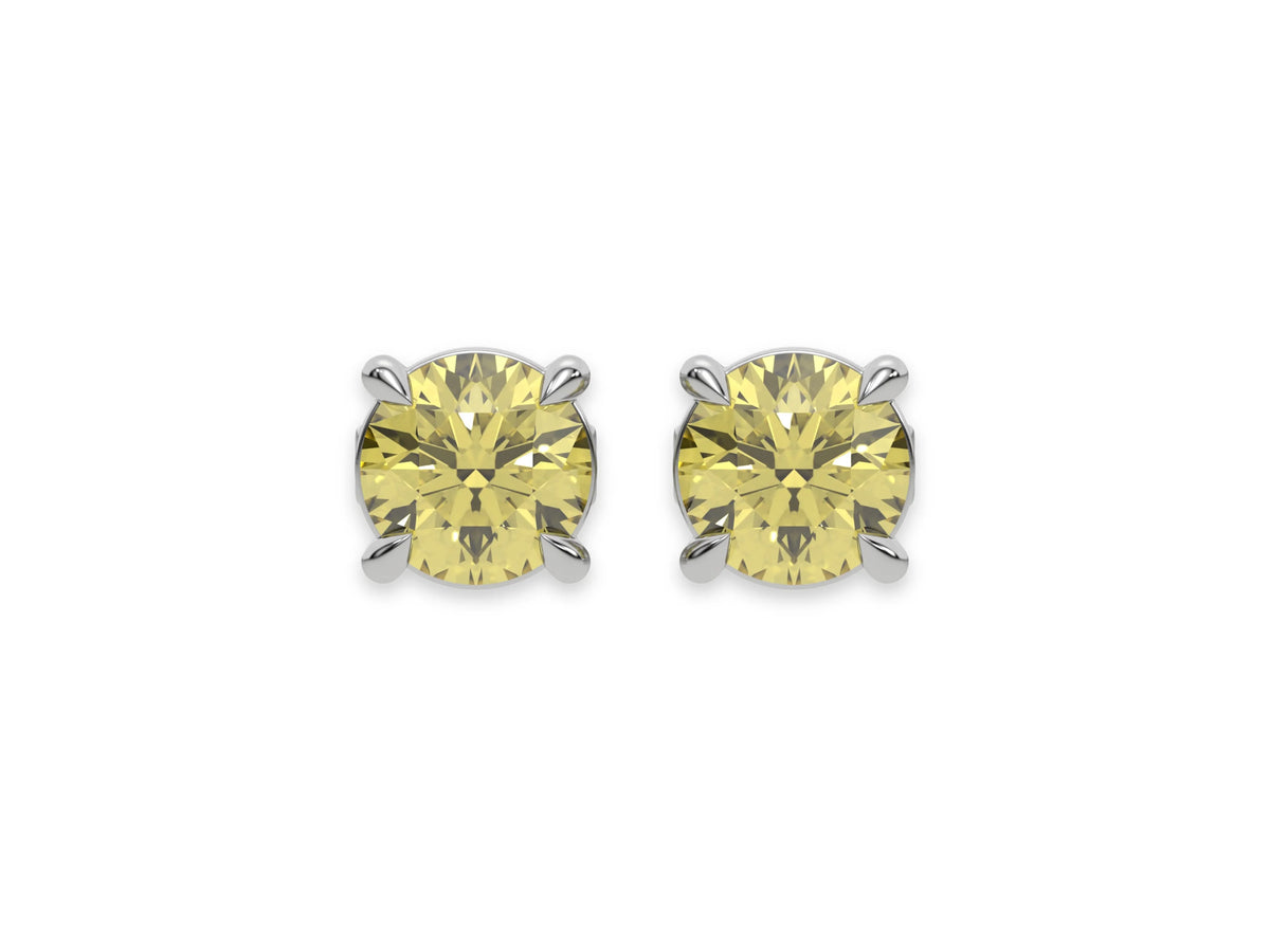 18k white gold Round Diamond Studs made with fancy yellow round brilliant-cut diamonds set in a four prong setting